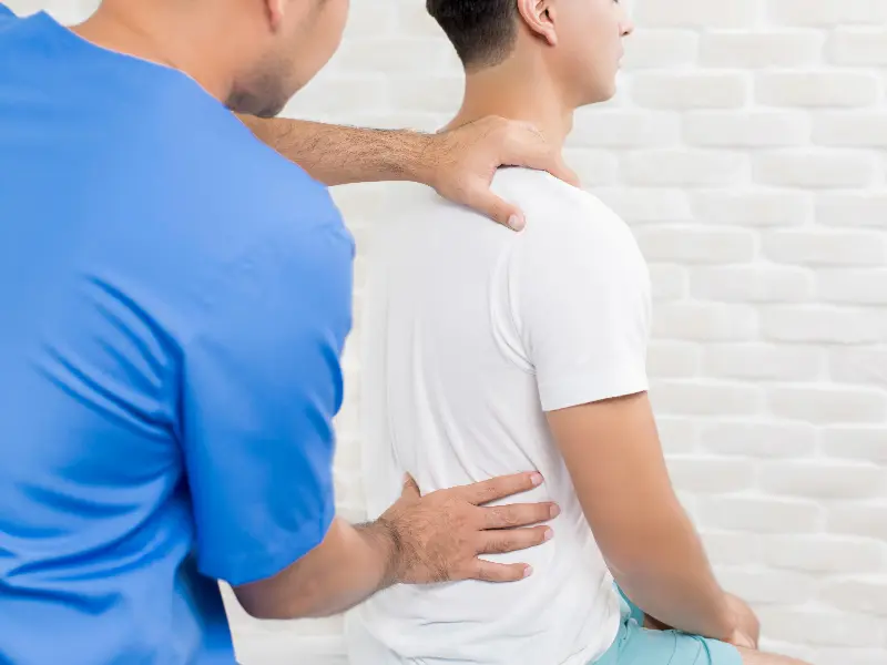 Treatment For Poor Posture Near Me in Escondido, CA. Chiropractic Exam For Posture Improvement.